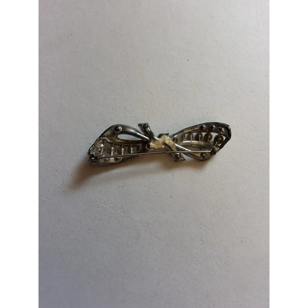 Silver Tone Bow Shape Rhinestone Brooch Pin, White/Colorless Clear Stones